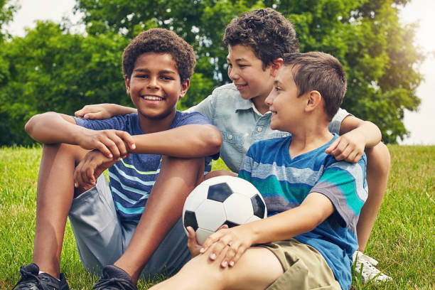 istock Football with a few good friends 897385250
