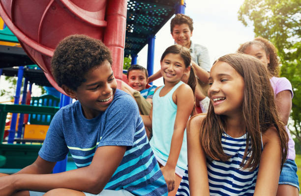 istock Puppy love at the playground 897385394
