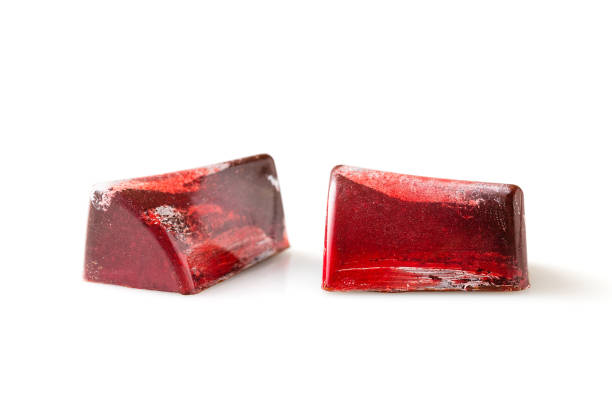 istock Red colored handmade chocolate candies on white background 897385654