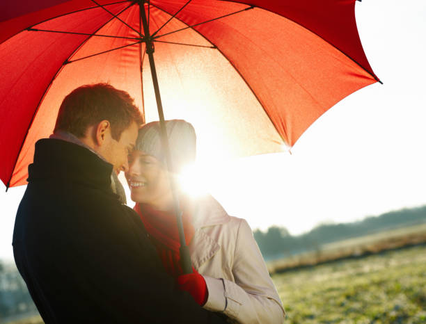 istock Portrait of a romantic couple relaxing under red u 89738662