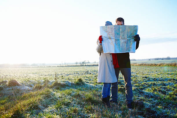 istock Portrait image of young couple reading map 89738668