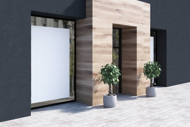 istock Black and wooden cafe facade, two posters side 897399390
