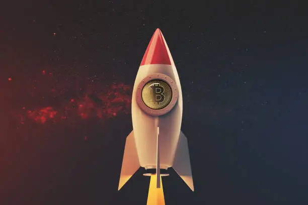 Photo of White and red rocket in space