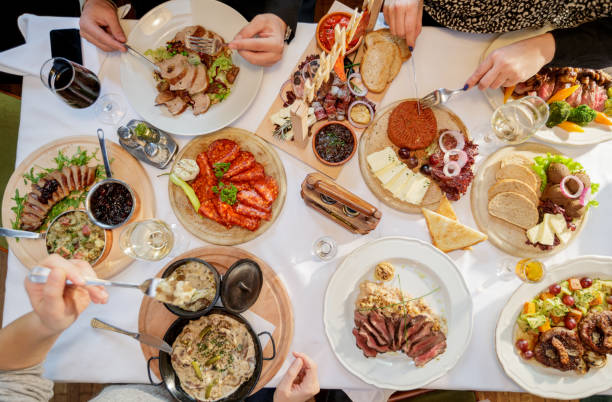 istock Directly above view of group of people having lunch 897400162