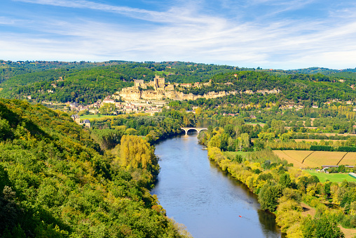 Village and Chateau Beynac-et-Cazenac on the bank of the river Dordogne in southern France. View from Castelnaud village to the Dordogne Valley,