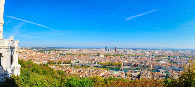Lyon cityscape from above with Rhone River, bridges, old city and new city buildings in september.