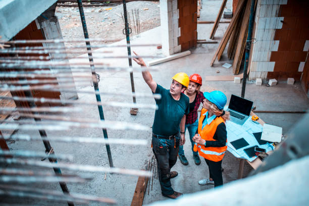 lavori in cantiere - teamwork business construction confidence foto e immagini stock