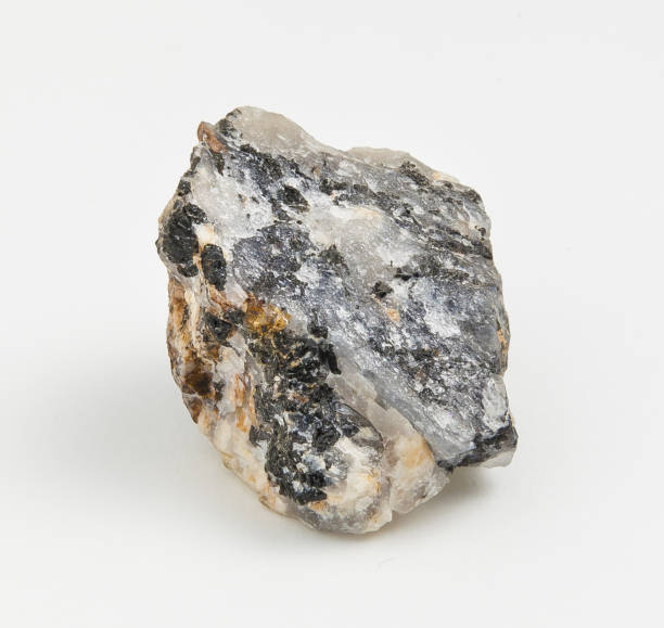 istock Tourmaline ore on white background 897447554