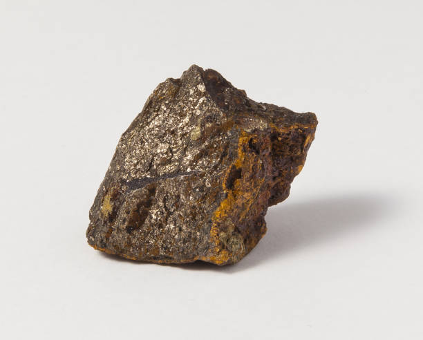 istock Pyrrhotite ore on white background. 897447820