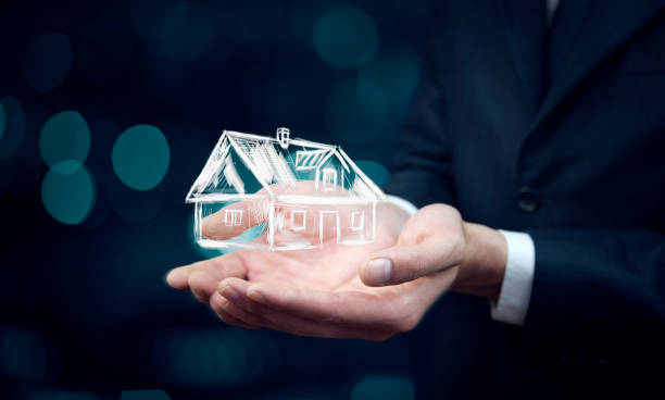 istock businessman hand house icon 897457850