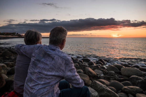 istock hug you looking at the sea 897461918