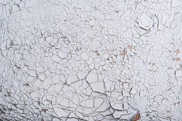 istock Old weathered painted wooden board texture 897475152