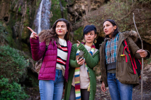 istock Girls Aiming For Direction In Nature 897497934