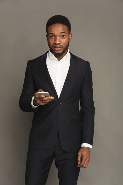 istock Handsome young black man portrait at studio background. 897497994