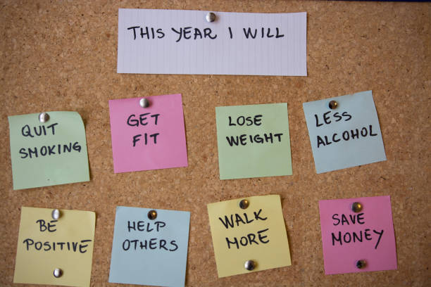 new year's resolutions - determination new years eve list aspirations imagens e fotografias de stock