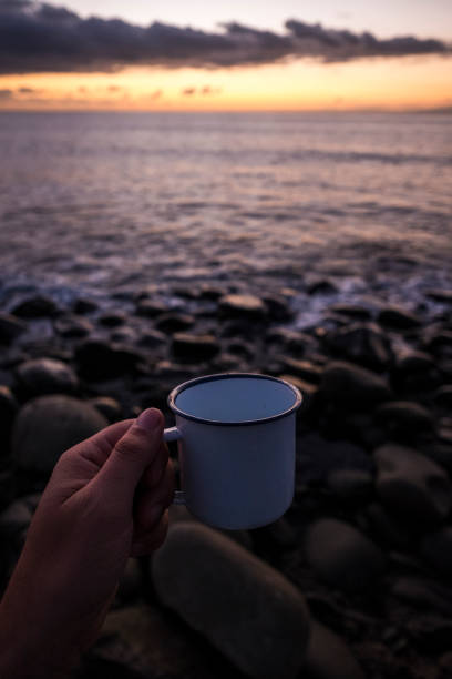 istock cup of tea at sunset 897504302