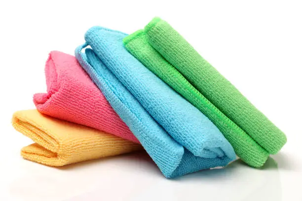 Photo of Set of microfiber cleaning cloths isolated on white background