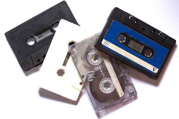 istock Old cassette tapes with a wooden background 897509722