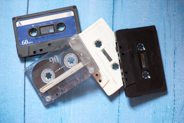 istock Old cassette tapes with a wooden background 897509734