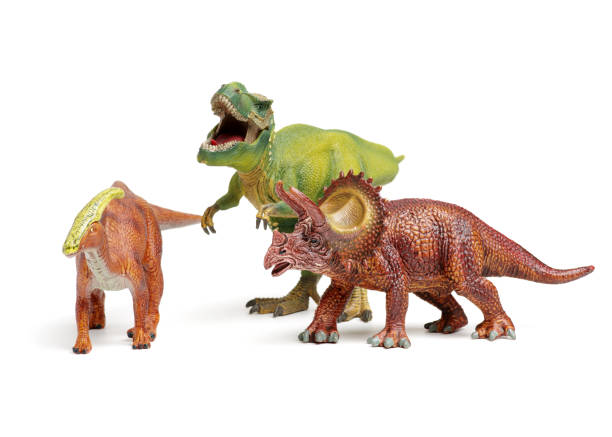 dinosaures en plastique modèles isolés sur fond blanc - dinosaur toy dino monster photos et images de collection