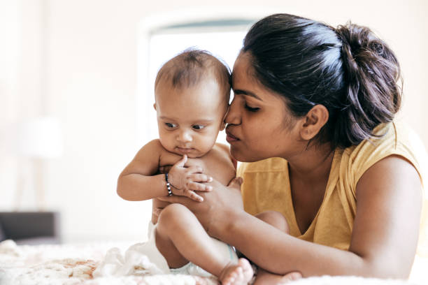 istock Mom and baby indoor 897525232