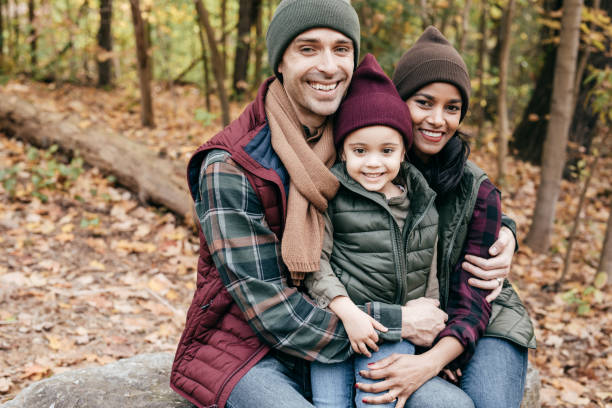 istock Parents and daughter in the park 897525246