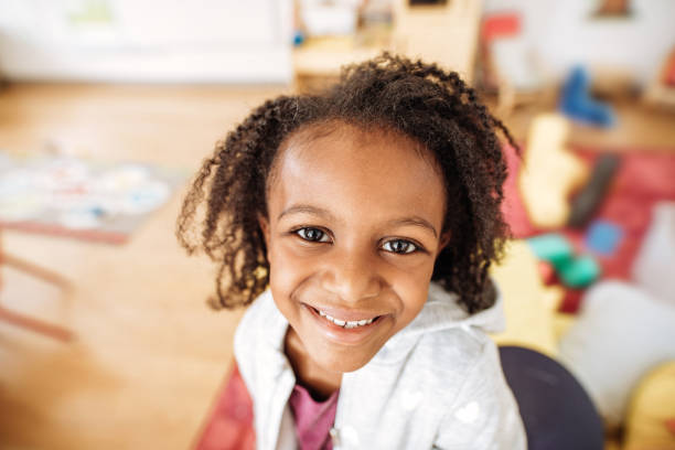 istock Close up of smiling preschooler 897525282