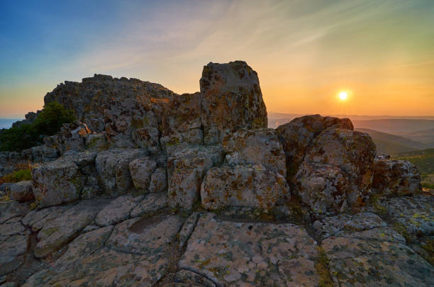 Sunset over Ancient Megalithic Observatory Kokino stock photo