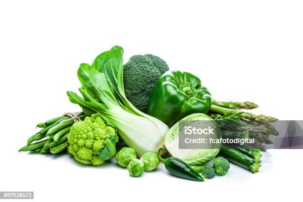 Healthy Fresh Green Vegetables Heap Isolated On White Background Stock Photo - Download Image Now