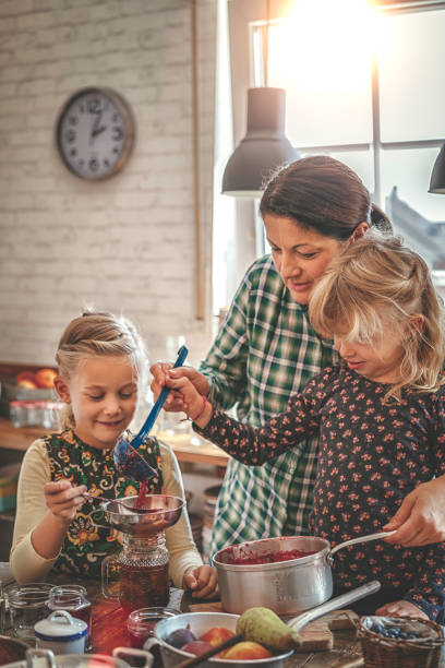 istock Preparing Homemade Berry Jam and Canning in Jars 897535884