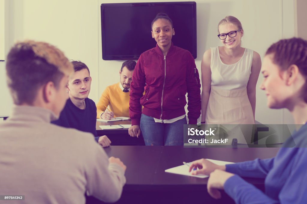 Break Between Class Young Classmates Having Animated Talks At Break Between Classes Stock ...