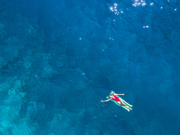 istock Woman at the sea 897547418