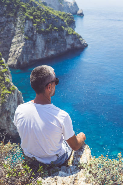 istock Man and the sea 897557836