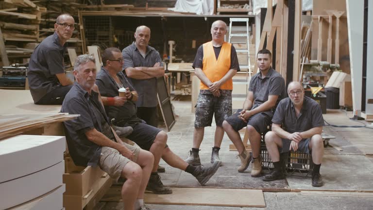 Group portrait of carpenters (slow motion)