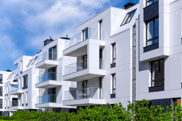 istock Modern white facade in new apartment building 897569508