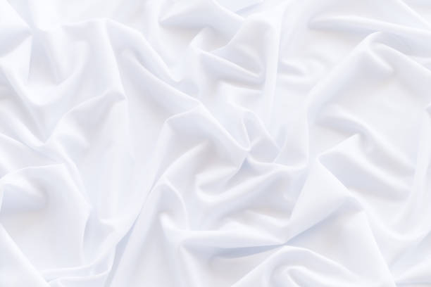 istock White cloth background and texture, Crumpled of white fabric abstract 897569692