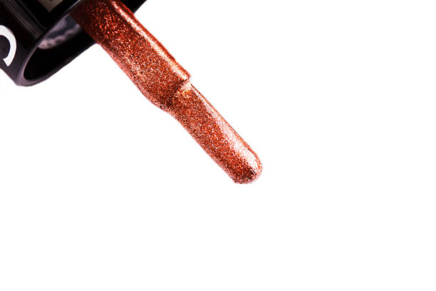 istock Nail polish. Brush macro. Clipping path. Isolated on white background. 897570068