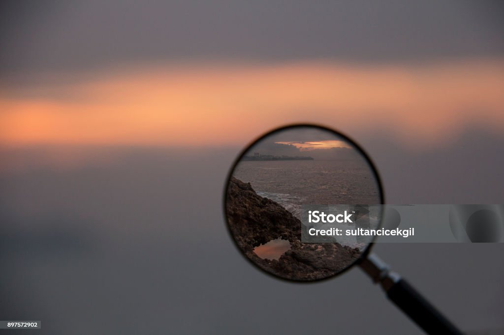 Searching sunset, Magnifying Glass, Eye, Commercial Sign, Human Eye, Focus - Concept Stock Photo
