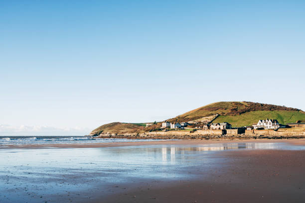 Croyde beach on the coast of North Devon, England Croyde beach looking north towards Baggy Point. It is a popular beach on the North coast of Devon in South West England. croyde bay photos stock pictures, royalty-free photos & images