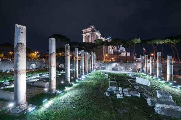 Photo of Nightly view of the Basilica Ulpia in Rome, Italy