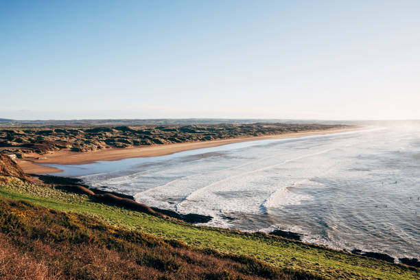 istock Saunton Sands beach on the coast of North Devon, England 897630506