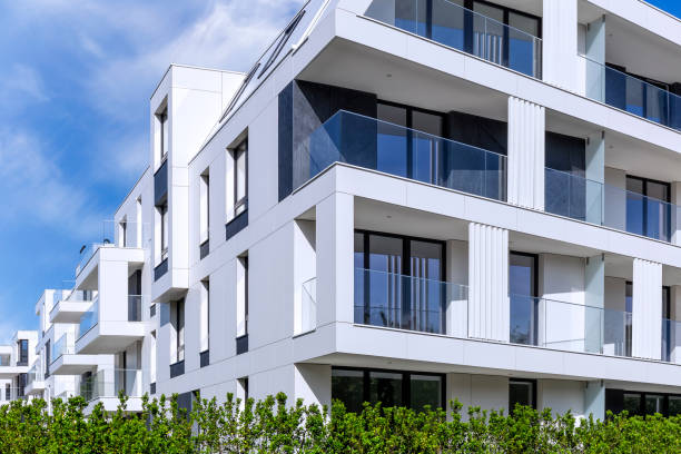 istock Modern white facade in new apartment building 897642592