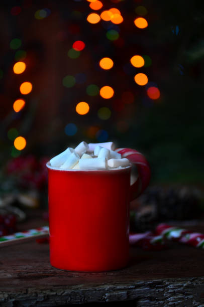 istock Hot chocolate and marshmallows on wooden table 897646584