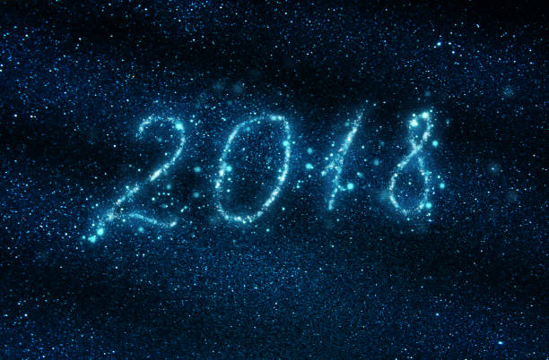 istock Happy New Years 2018 with glitter lights background. de-focused. 897656664