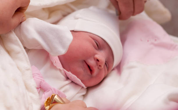 istock New born baby in hospital 897664302