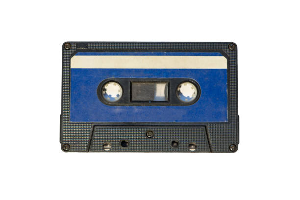 istock Old cassette tapes with a wooden background 897665428