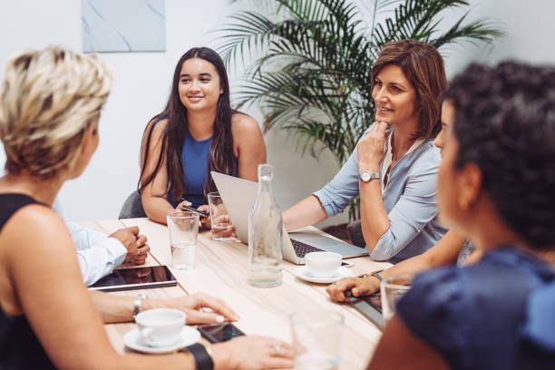 istock Applicant for new job position talking to management staff 897667678