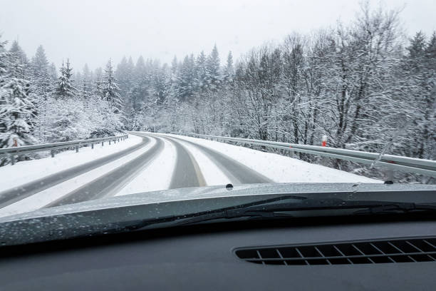 istock Snowy road in winter 897668292