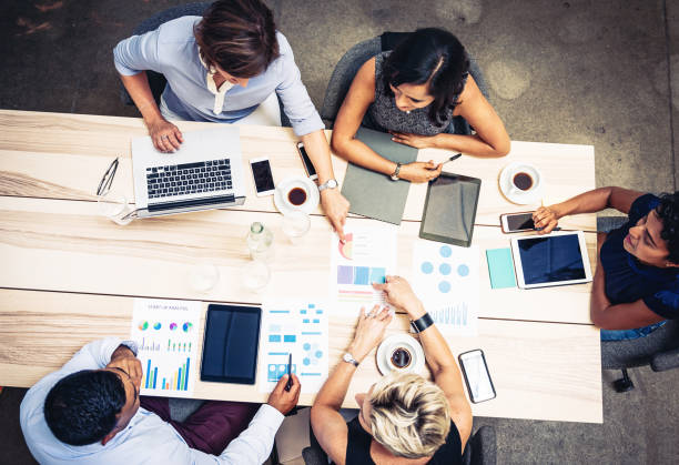 istock Leaders sitting at the table and finding common goals for business 897668312