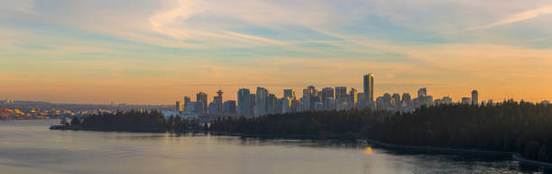 istock Vancouver BC Canada  downtown city skyline by Stanley Park during sunset panorama 897668354